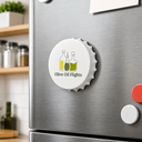 A unique bottle-cap-shaped white magnetic bottle opener with the Olive Oil Flights logo, mounted on a fridge